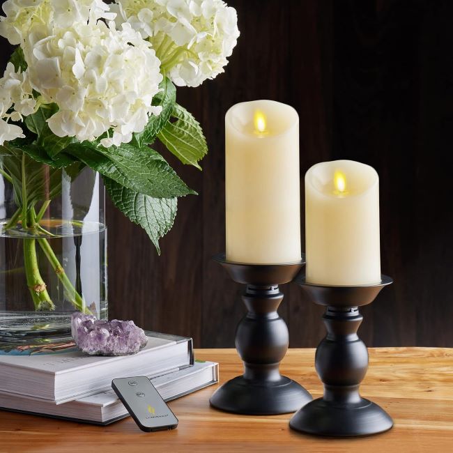 Luminara realistic flameless ivory pillar candle with moving flame effect for premium wedding setups