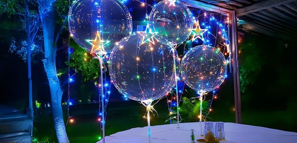 Close-up of affordable LED fairy lights used for indoor party decoration setup