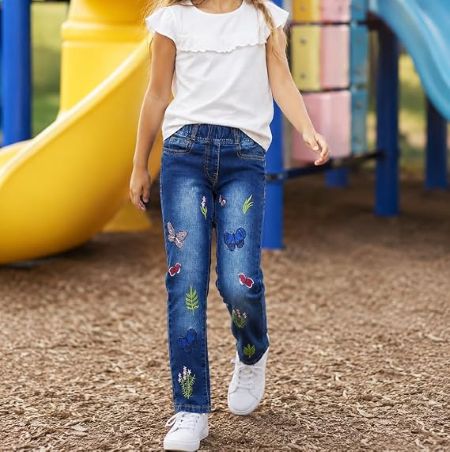 KIDSCOOL girls' denim jeans featuring embroidered accents for a fashionable look