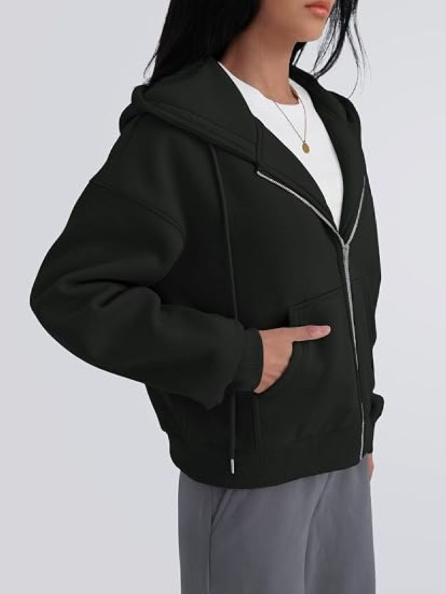 Trendy Queen women's full-zip hoodie styled with jeans for a trendy casual outfit